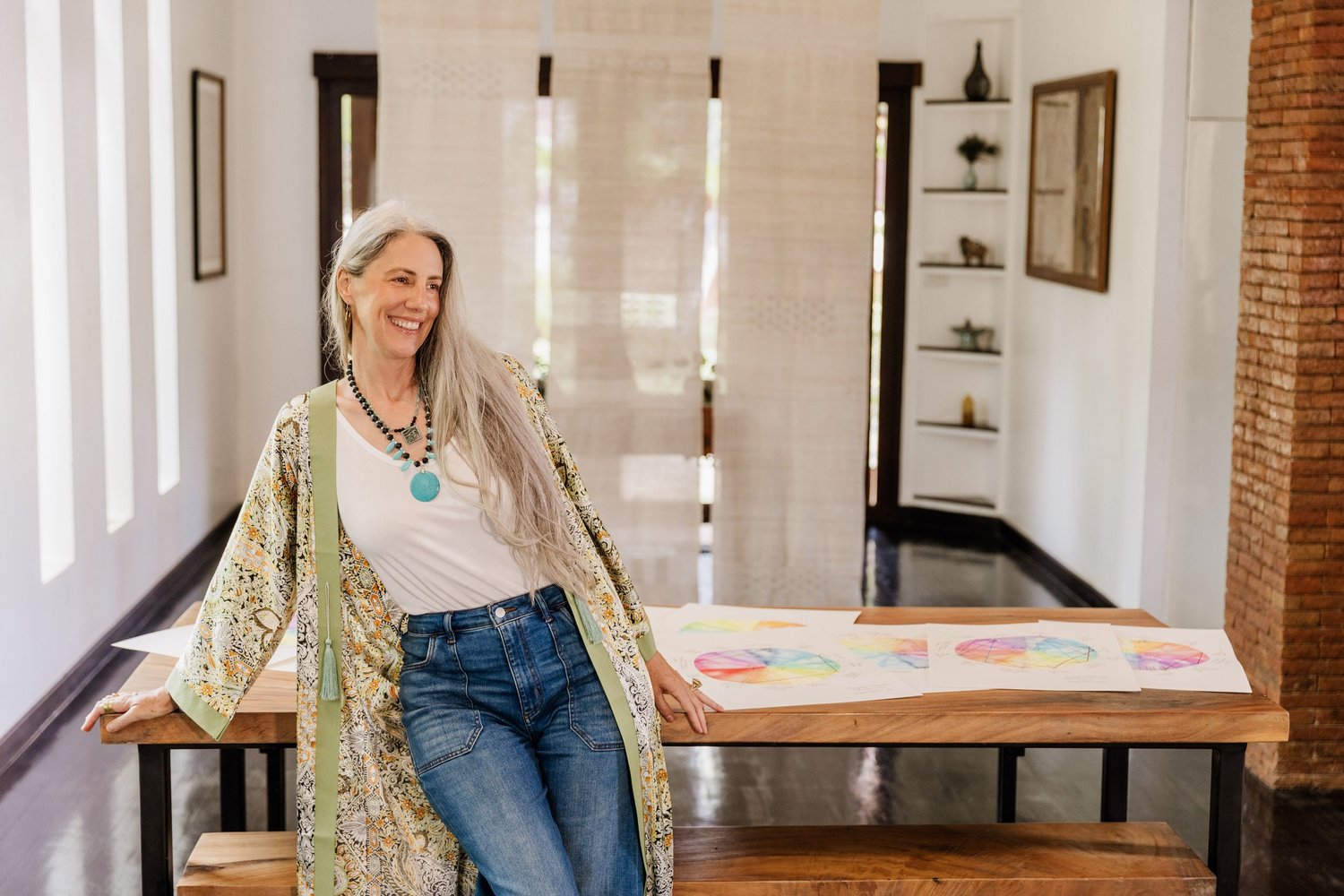 Helen Fehr in her workspace ready for a natal chart reading session